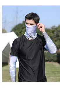 Outdoor detail shot showing ice silk sun protection sleeves and breathable face mask.