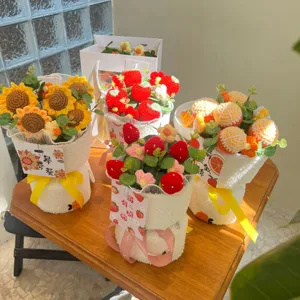 Handmade crochet flower bouquet featuring cute sunflowers and strawberries. Perfect gift.