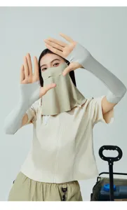 Detail view of women's UV protection face mask and cooling arm sleeves for cycling outdoor.
