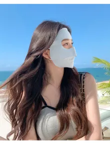 Close-up detail shot of the breathable ice silk sun protection face mask worn outdoors.