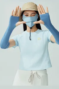 Detail of breathable 3D cooling sun protection mask on model with matching blue arm sleeves