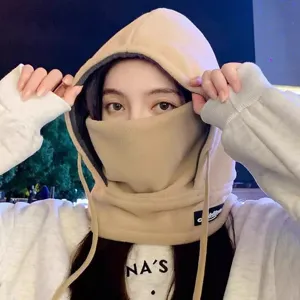 Close-up of the thick fleece windproof hooded mask, soft thermal fabric covering face and ears.