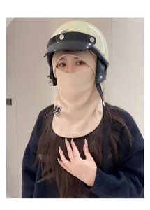 Close-up detail of beige thermal face mask and neck warmer for winter outdoor riding