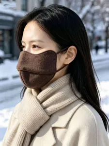 Detail view of winter brown 3D wool blend face mask, warm and windproof outdoor wear.