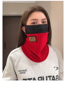 Detailed view of the winter fleece thermal cycling face mask and neck gaiter in black and red.