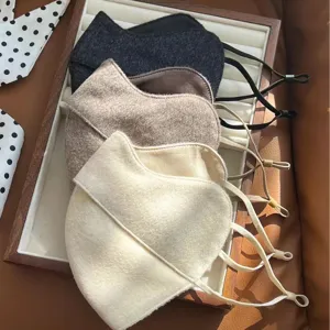 Stylish winter wool face mask, thick warm 3D design with adjustable ear loops for women.