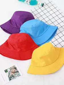 Detailed view of colorful solid bucket hats, breathable sun protection design for outdoor wear.