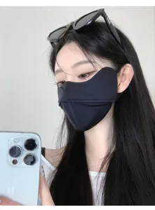 Closeup of black 3D ice silk sun protection face mask featuring eye corner coverage.