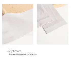 Close-up detail view of the light grey ice silk fabric, showing smooth texture and fine stitching.