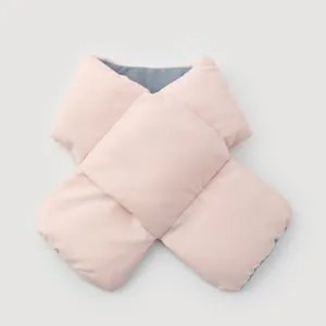 Detailed view of a pink puffer scarf featuring soft grey fleece lining for winter