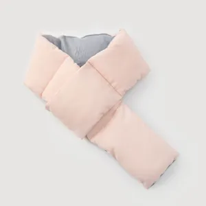 Detailed view of pink quilted winter scarf with soft grey fleece lining for women