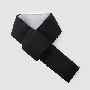 Close-up of black padded windproof scarf with soft gray fleece lining for winter