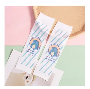Detailed shot of kids sun protection sleeves with cute dinosaur print and soft ice silk fabric.