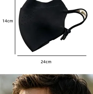 Detail view of winter windproof 3D black face mask with ventilation holes and adjustable strap.