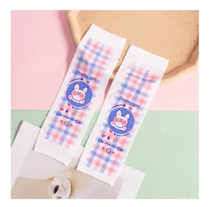 Detailed view of cute kids sun protection ice sleeves with sweet plaid and rabbit print.
