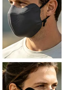 Close-up detail of dark grey 3d windproof cycling face mask with breathable ventilation holes.