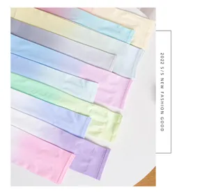 Gradient ice silk arm sleeves for outdoor sun protection, breathable and stylish design detail.