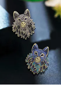 Detailed view of vintage wolf head brooches with colorful rhinestones for suits