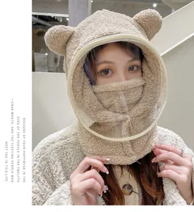 Detail view of plush bear ear hat featuring a transparent anti-fog protective face shield