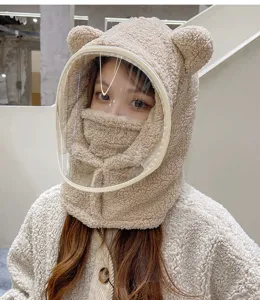 Detail shot of plush bear ear winter hood with clear anti-fog face shield and face mask