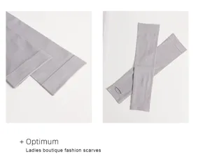 Detailed view of gray cooling ice silk arm sleeves with thumb hole for sun protection