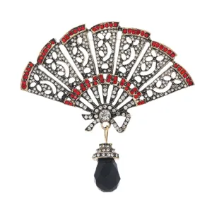 Elegante vintage Chinese waaierbroche met rode strasstenen en zwarte kristallen hanger.