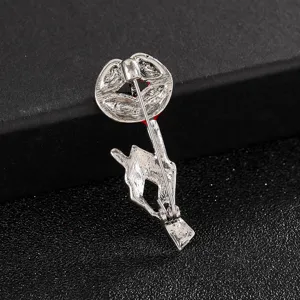 Elegant silver metal red lip brooch accessory showing a detailed view of the back pin clasp