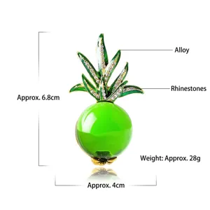 Green jelly glass pineapple brooch with rhinestones and golden alloy finish