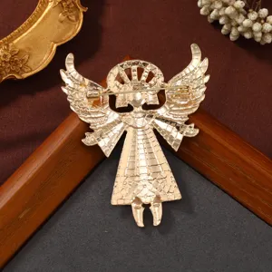 Vintage gold-tone alloy angel brooch wings badge, detailed back view with safety pin
