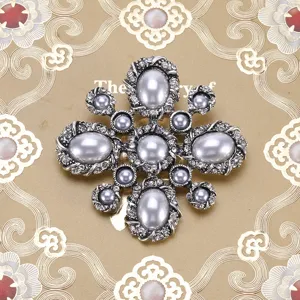 Elegant vintage Baroque style silver brooch featuring grey pearls and rhinestones
