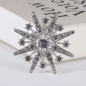 Elegant vintage Baroque star brooch pin featuring sparkling silver clear rhinestones