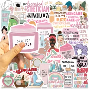 Close-up of aesthetic skincare stickers featuring pink beauty self-care quotes and jars