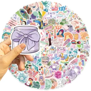 Close-up view of skincare and makeup stickers for laptop and phone case decoration