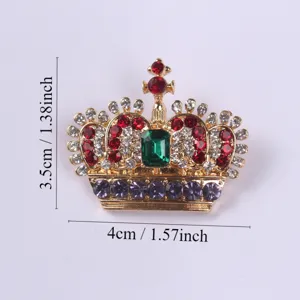 Detailed view of luxury gold crown brooch featuring colorful crystals and size dimensions