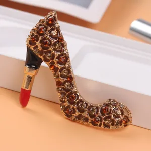 Detailed view of rhinestone high heel shoe brooch featuring a creative lipstick heel