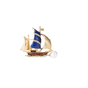 Exquisite gold-plated alloy sailboat brooch with blue enamel and elegant pearl detail