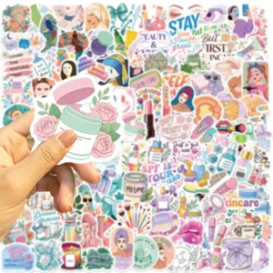 Detailed view of a hand holding a floral skincare cream sticker from a beauty sticker set