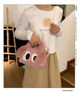 Lindo bolso bandolera de piel sintética rosa con ojos grandes para el estilo de invierno