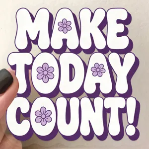 Close-up of transparent purple sticker with "Make Today Count" text for planners