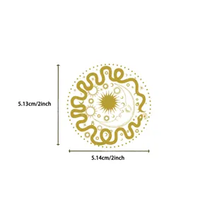 Detailed view of a golden foil sun and moon PET sticker with 2 inch diameter markings