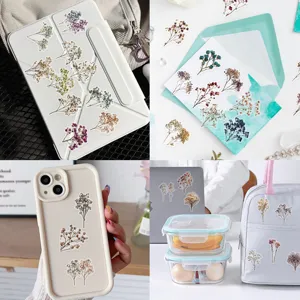 Vibrant retro baby's breath flower PET stickers decorating laptop, phone case and bag