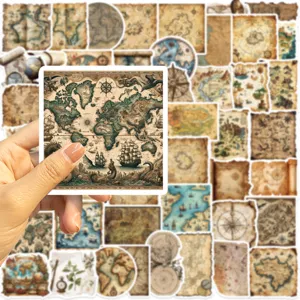 Hand holding a detailed vintage world map sticker featuring ancient ships and compass