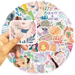 Detailed view of a hand holding skincare-themed cartoon stickers for DIY scrapbooking