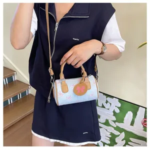 Summer style light blue denim mini Boston bag with cute pink bow prints and brown strap
