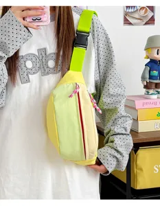 Cute Japanese style pastel color blocking waist bag with neon green strap on a model.