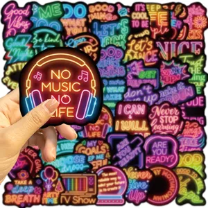 Macro view of a neon 'NO MUSIC NO LIFE' sticker with headphones and music notes