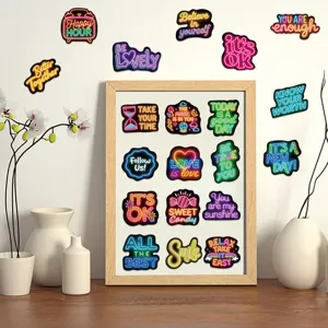 Close-up detail showing various colorful neon inspirational quote stickers applied to a wall