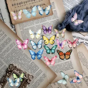 Assorted vibrant PET butterfly stickers displayed on vintage paper for journal decoration