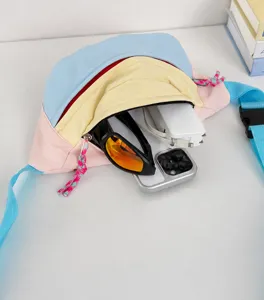 Interior view of a cute pastel chest bag showing capacity for power bank and phone