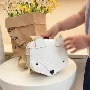 Detailed view of a cute white fox-shaped mini backpack for kids' outdoor travel.